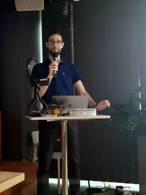 Wojtek during presentation about JavaScript and IoT